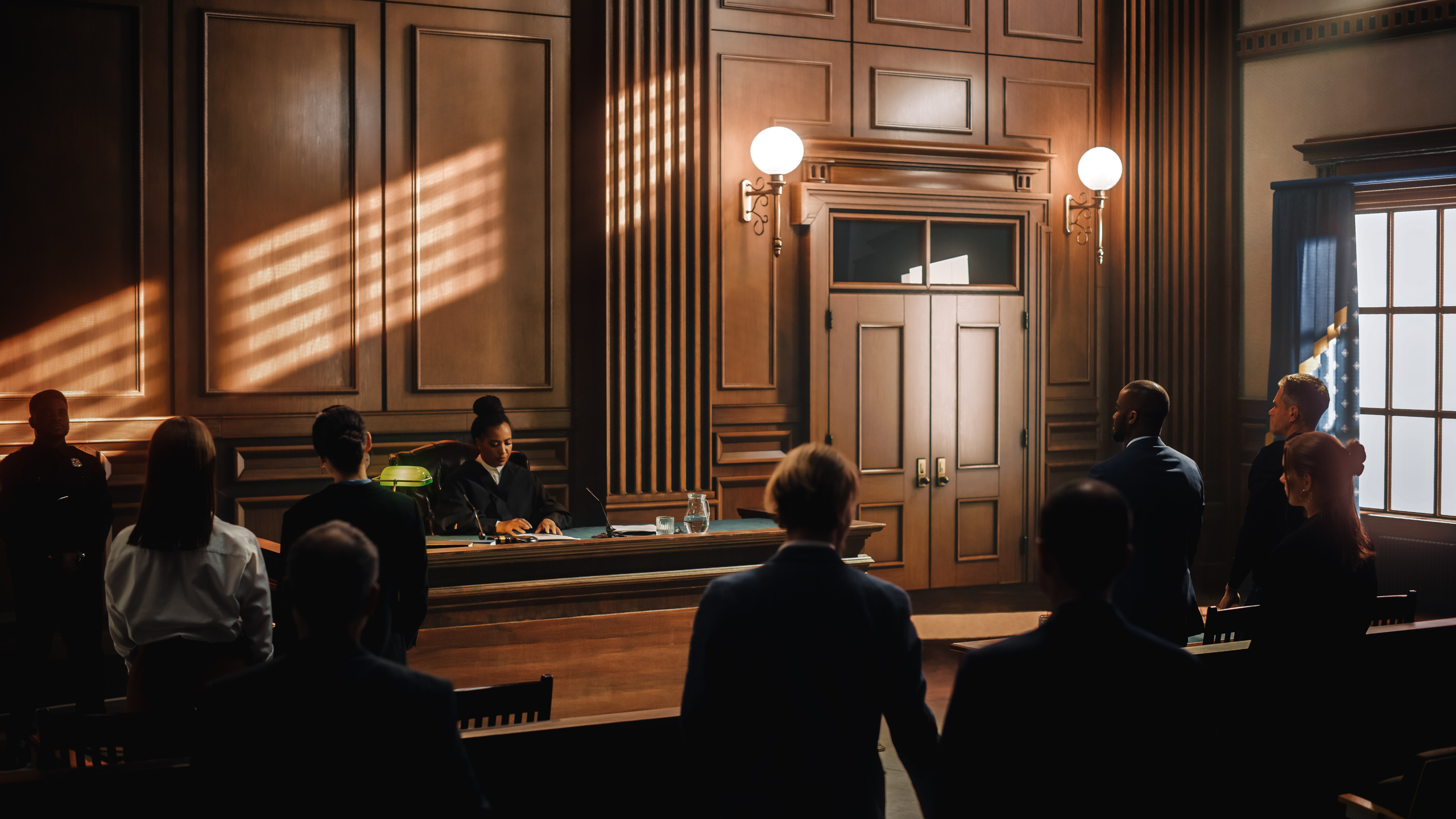 Court of Justice Trial: Impartial Judge is Sitting, Public Stands. Supreme Federal Court African American Judge Starts Civil Case Hearing with Striking a Gavel.